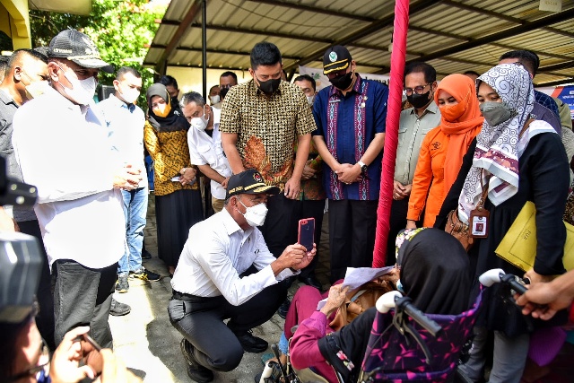 Menko PMK, Muhajir Efendi bersama Gubsu Edy Rahmayadi dan Wali Kota Medan, Bobby Nasution, di Belawan