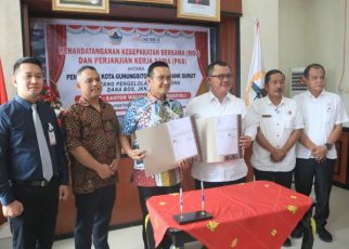 Wali Kota Gunungsitoli, Sowa’a Laoli & Direktur Bisnis-Syariah Bank Sumut, Syafrizalsyah, teken MoU pengelolaan dana BOS, JKN dan Dana Opsen (1)